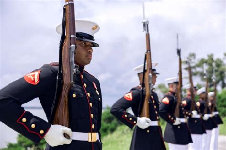 Do enlisted Marines pay for their uniforms?