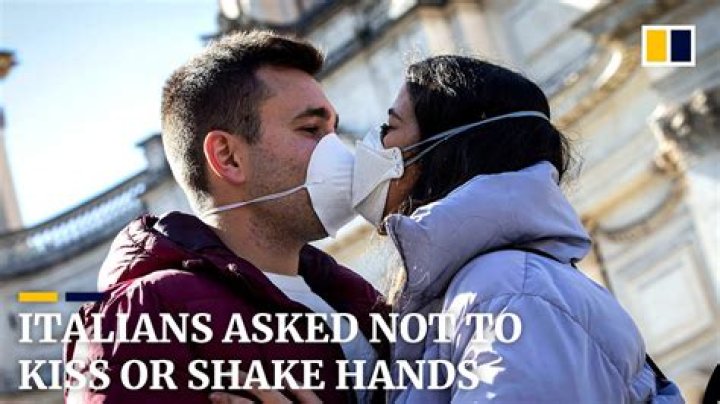 Do Italians kiss each other mouth?