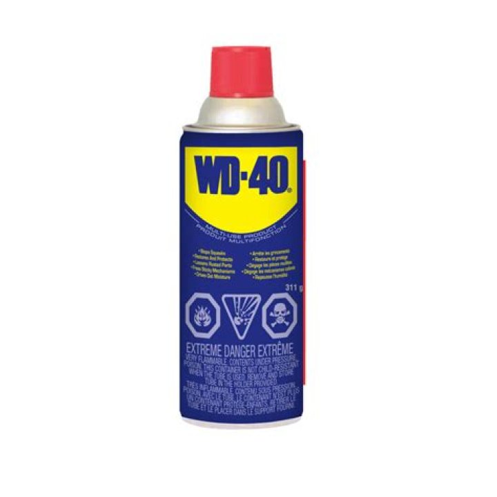 Does WD-40 dissolve calcium deposits?
