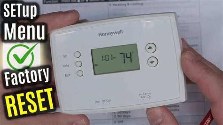 How do you reset a thermostat on a boiler?