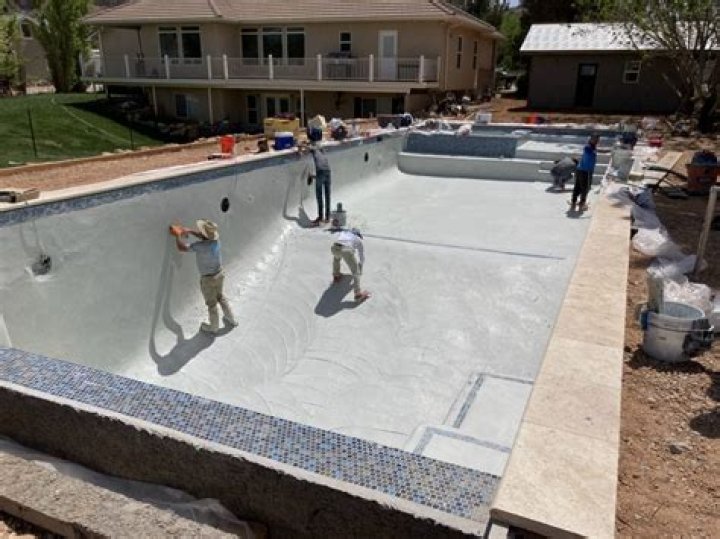 How long do you have to brush new pool plaster?
