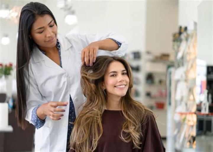 What do hairdressers spray on your hair before cutting?