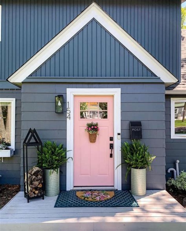 What does a pink front door mean?