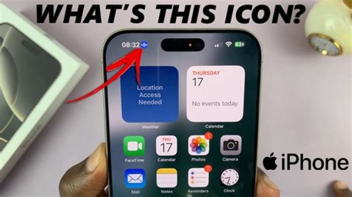 What is the arrow in the top left corner of my iPhone?
