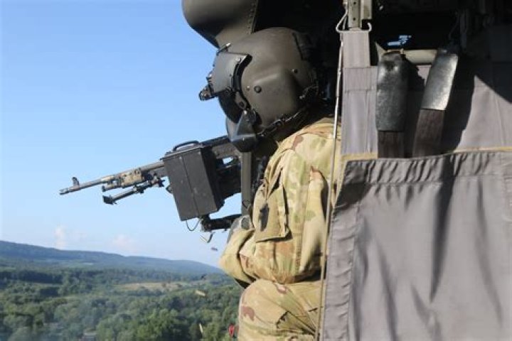 What MOS is a door gunner in the USMC?