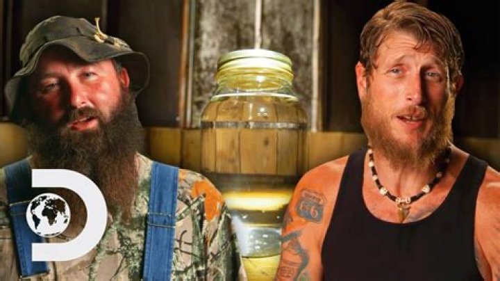 Why do moonshiners shake the jar?